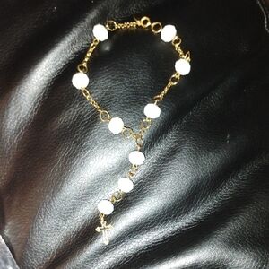 Gold and White Beaded Bracelet with Cross Charm